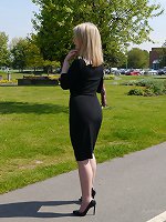Traditional English Milf Jenny is wearing a sexy black dress and matching tall black high heels
